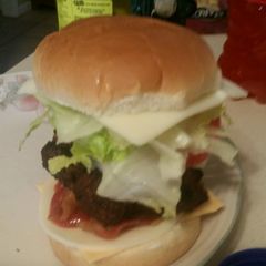 A picture of Grilled bacon dorito cheese burgers.