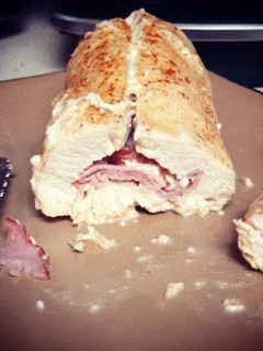 A picture of grilled chicken cordon bleu.