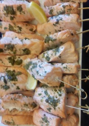 A picture of SALMON pops with dill capers crema.
