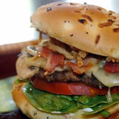 A picture of Seasoned Big Boy Turkey Burger with Feta and Frenchs French Fried Onions.