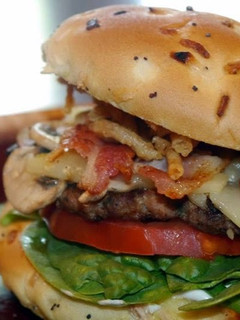 A picture of Seasoned Big Boy Turkey Burger with Feta and Frenchs French Fried Onions.