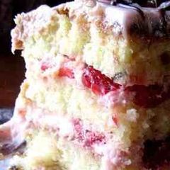 A picture of Vanilla Cake W/ Strawberry Cream Frosting.