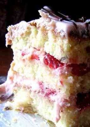A picture of Vanilla Cake W/ Strawberry Cream Frosting.