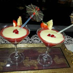 A picture of Pinacolada and strawberries mocktail.