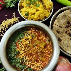 A picture of Kathiyawadi Sev Galka nu Shak (sponge gourd and sev curry).