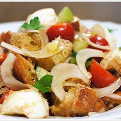 A picture of Panzanella with Mozzarella Cheese.
