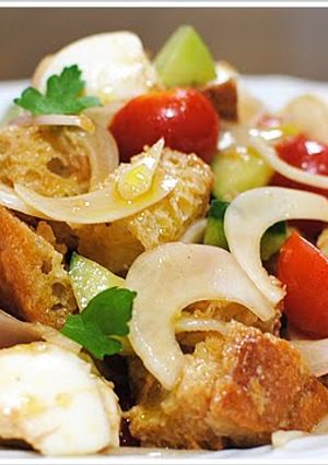 A picture of Panzanella with Mozzarella Cheese.