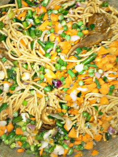 A picture of Spaghetti with veggies.