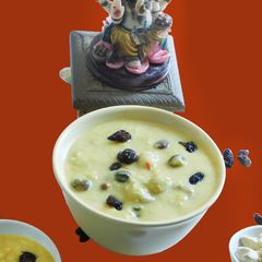 A picture of Pall payasam with almond milk, rice dumplings, (Paal kozhukattai in Tamil).