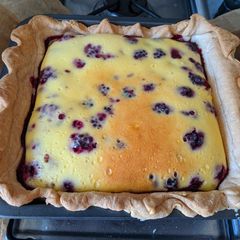 A picture of Ricotta and Blackberry cooked cheesecake.