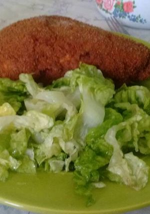 Una foto de Milanesa de pollo rellena