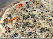 A picture of fish stew with coconut milk