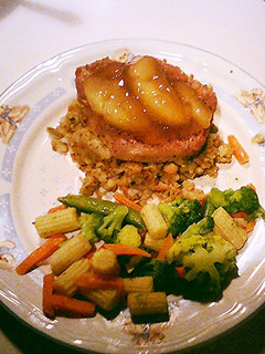 A picture of Pork Chops with Apple and Stuffing.