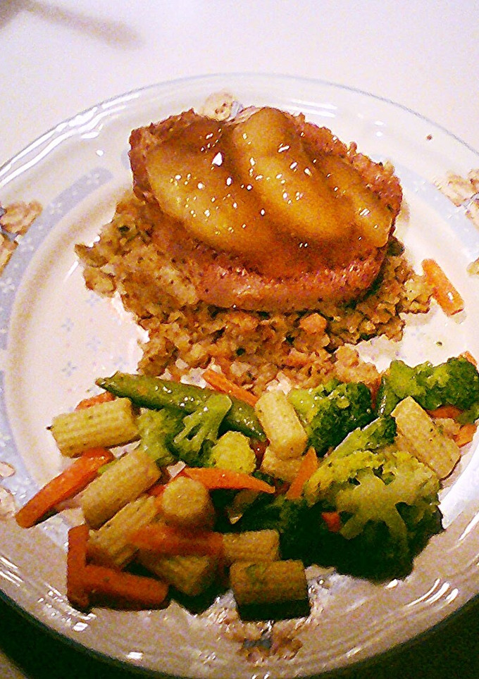 A picture of Pork Chops with Apple and Stuffing.