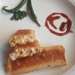 A picture of Paneer chicken bread roll.
