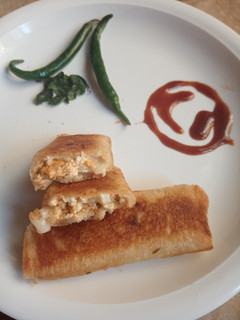 A picture of Paneer chicken bread roll.