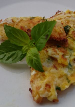 A picture of Crispy Chicken In Cheesy Basil Sauce.