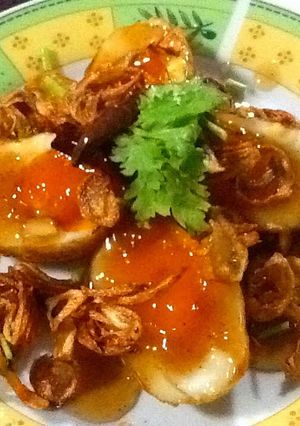 A picture of Thai Sweet And Sour Fried Boiled Eggs (Khai Luk Koei).
