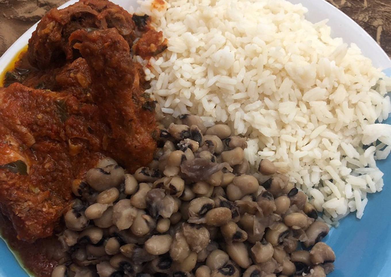 Beans,rice,goat and chicken stew