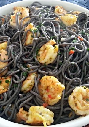 A picture of Simple, Black pasta with shrimp.