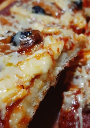 Une photo de Pizza aux fromages 🍕