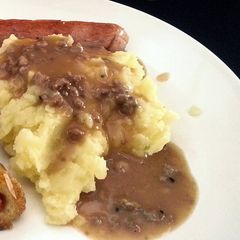 A picture of Mashed Potato with Gravy Sauce (in english & bahasa).