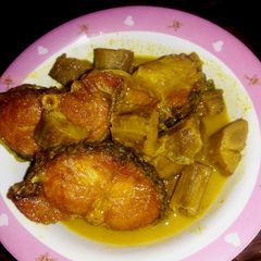 Leftover green banana with local fish curry A picture of Leftover green banana with local fish curry.