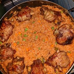 A picture of Jollof rice with turkey.
