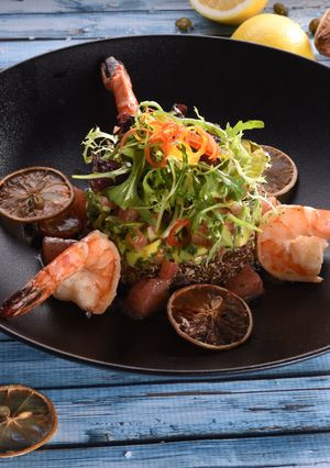 A picture of Shrimp avocado salad with quinoa.