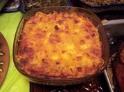 A picture of baked macaroni and cheese with panko