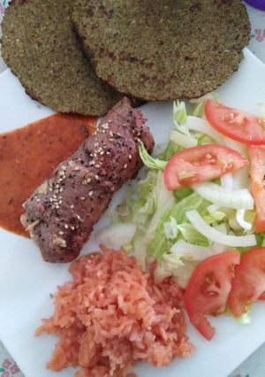 Una foto de Rollo de milanesa, con jamón y queso