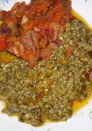 A picture of Fried goat meat with Kienyeji.
