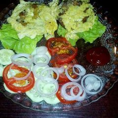 A picture of Cheesy Galouti Kebab in Egg Wrap.