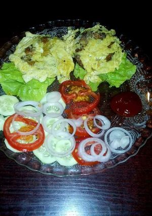A picture of Cheesy Galouti Kebab in Egg Wrap.