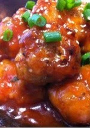 A picture of Okara Meatballs with a Thick Ketchup Sauce.