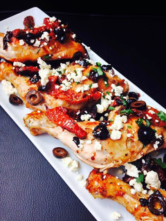 A picture of Pan-seared Chicken with sun-dried tomatoes and Olives.