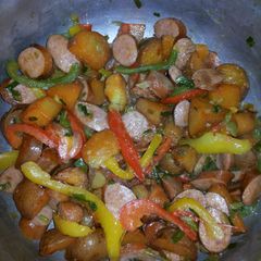 A picture of Baked Potatoes & Sausage.