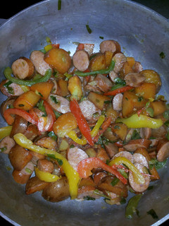 A picture of Baked Potatoes & Sausage.