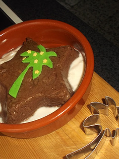 Una foto de Estrella de chocolate con palmera de fondant