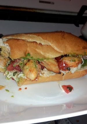 A picture of bruschetta chicken sandwhich.
