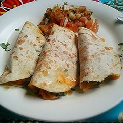 A picture of Beef quesadilla & pico de gallo.