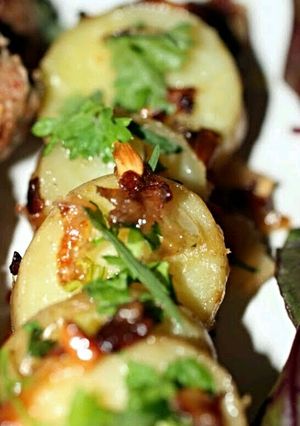 A picture of Sig's Potatoes in Shallot and Garlic Butter.