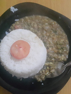 A picture of Green grams served with boiled rice.