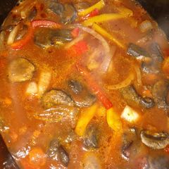 A picture of Italian sausage and peppers in the crock pot..
