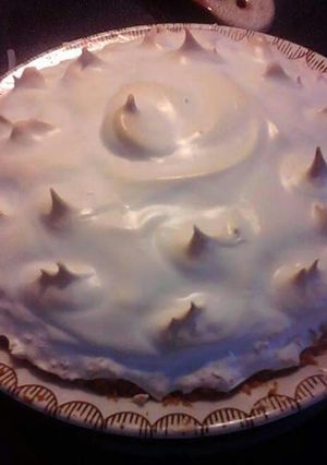 A picture of Lemon Meringue Pie with Gluten Free Coconut Crust.