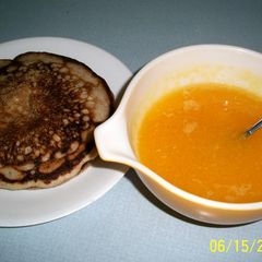 A picture of Orange sauce for pancakes and waffles.