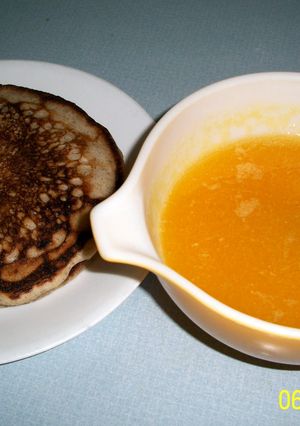 A picture of Orange sauce for pancakes and waffles.