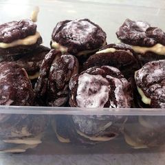 A picture of Red Velvet Crinkles with Cream Cheese Filling.