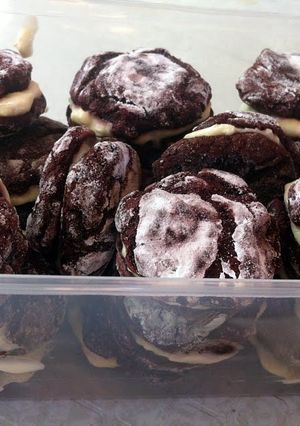 A picture of Red Velvet Crinkles with Cream Cheese Filling.