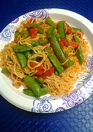 A picture of Tomatoes and ramen.